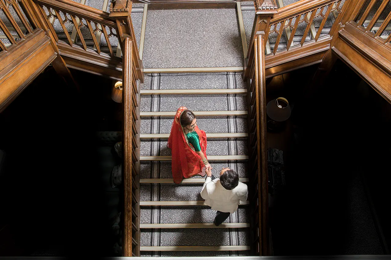 Couple climbing stairs